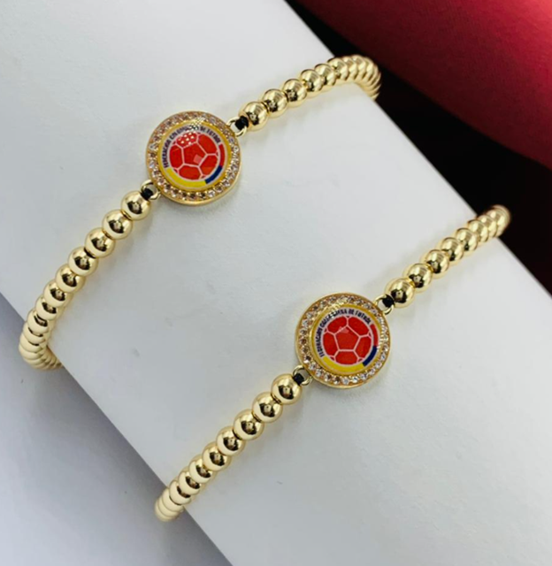 PULSERA RODIO COLOMBIA DORADO ESCUDO