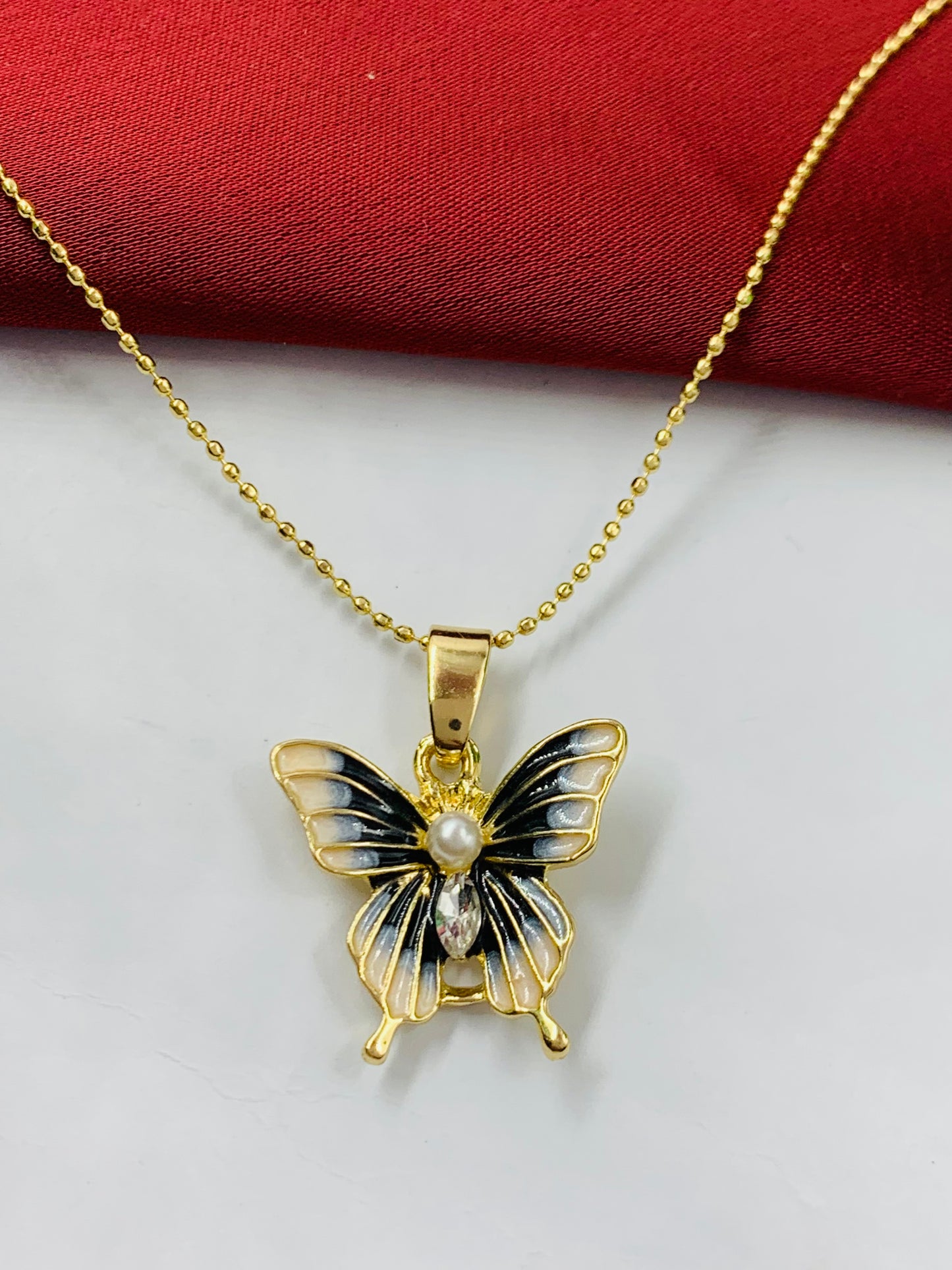 DIJE RODIO MARIPOSA DORADO