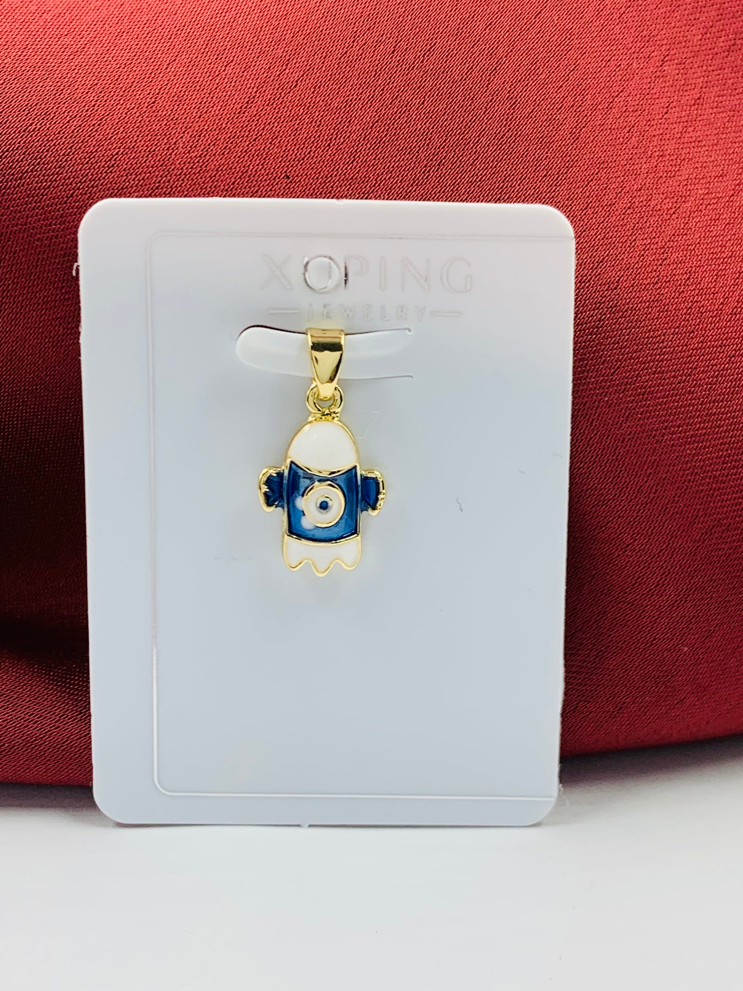 DIJE RODIO COHETE DORADO