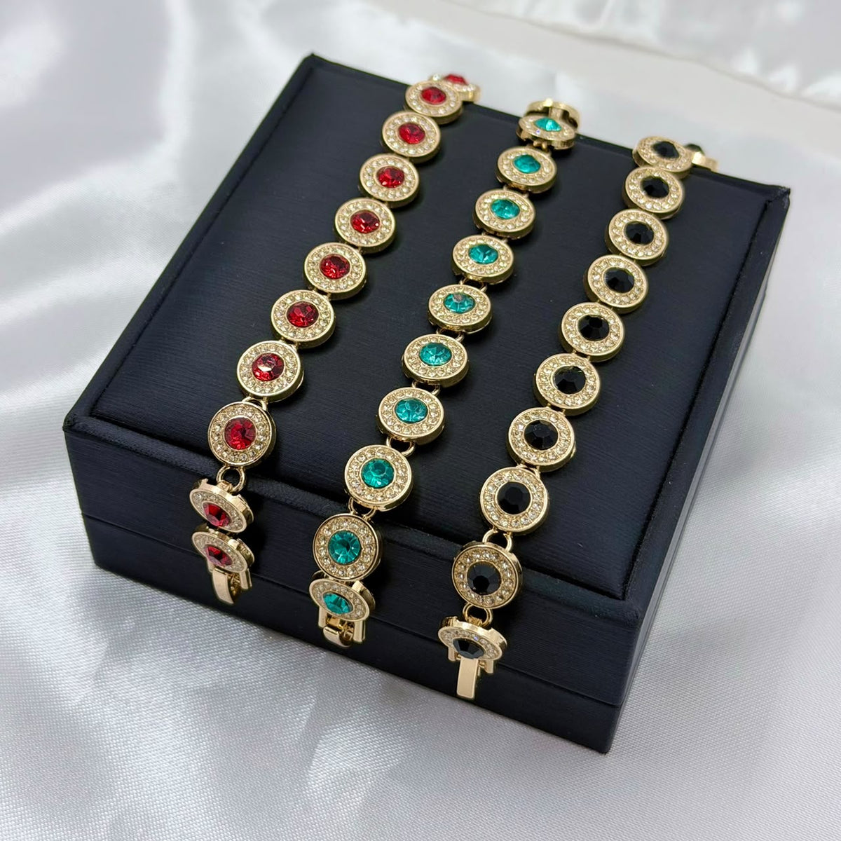 PULSERAS RODIO CIRCON REDONDO CENTRO COLORES DORADO