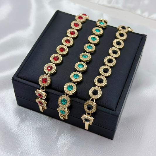 PULSERAS RODIO CIRCON REDONDO CENTRO COLORES DORADO