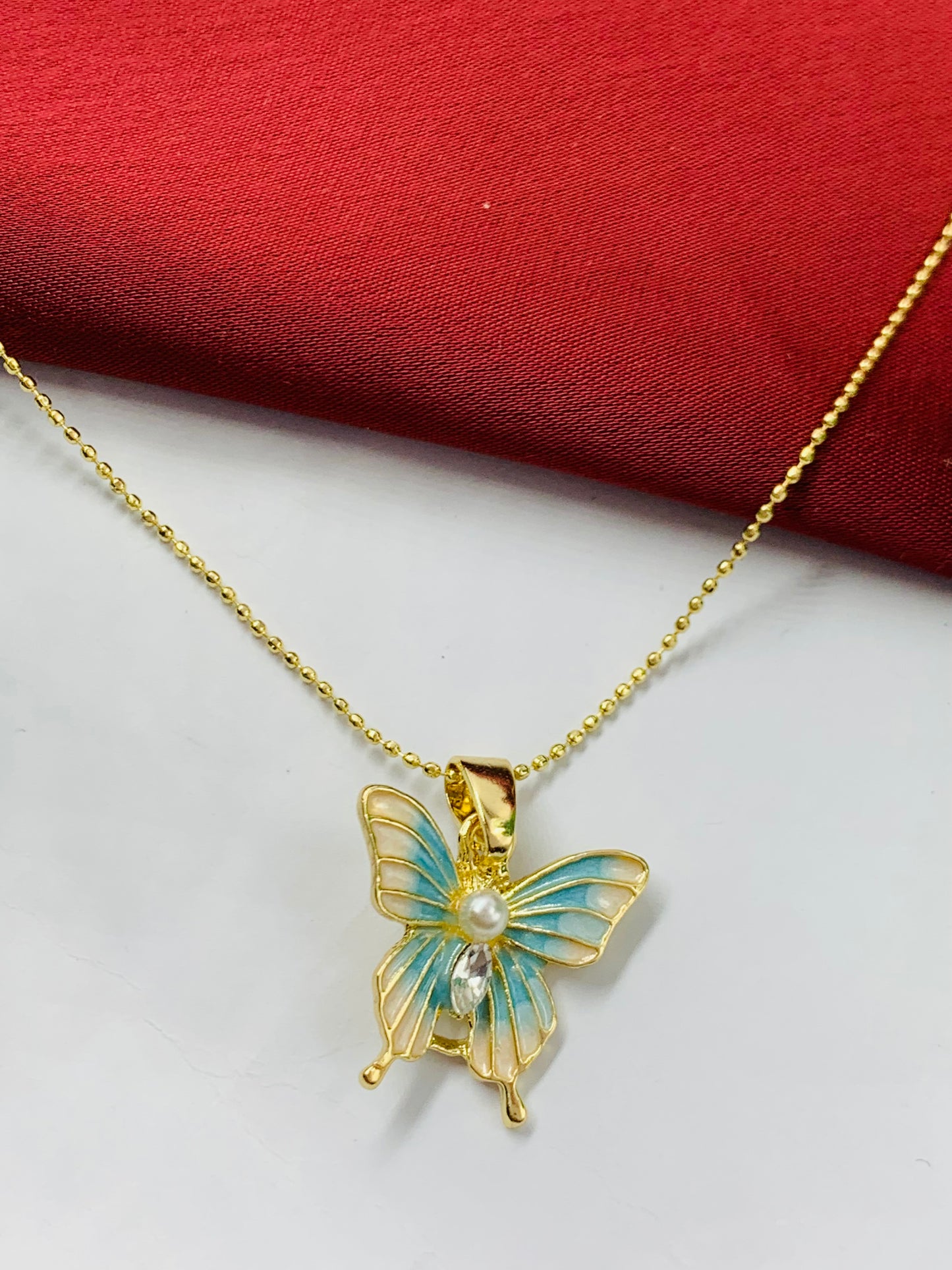 DIJE RODIO MARIPOSA DORADO