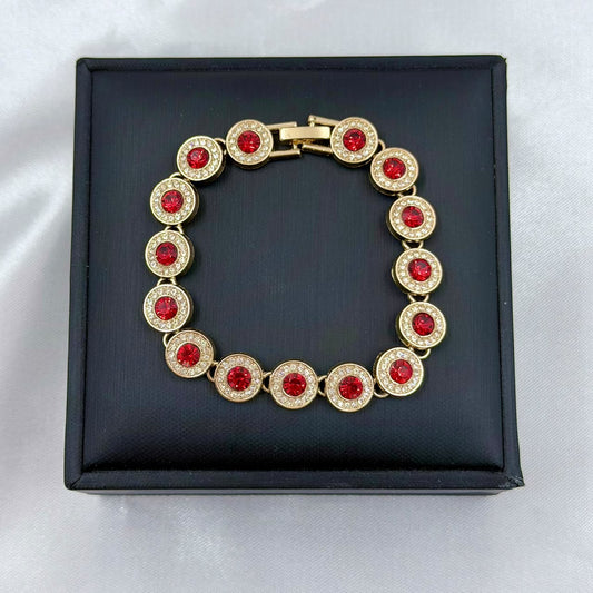 PULSERA RODIO ROJO CIRCON REDONDO CENTRO DORADO