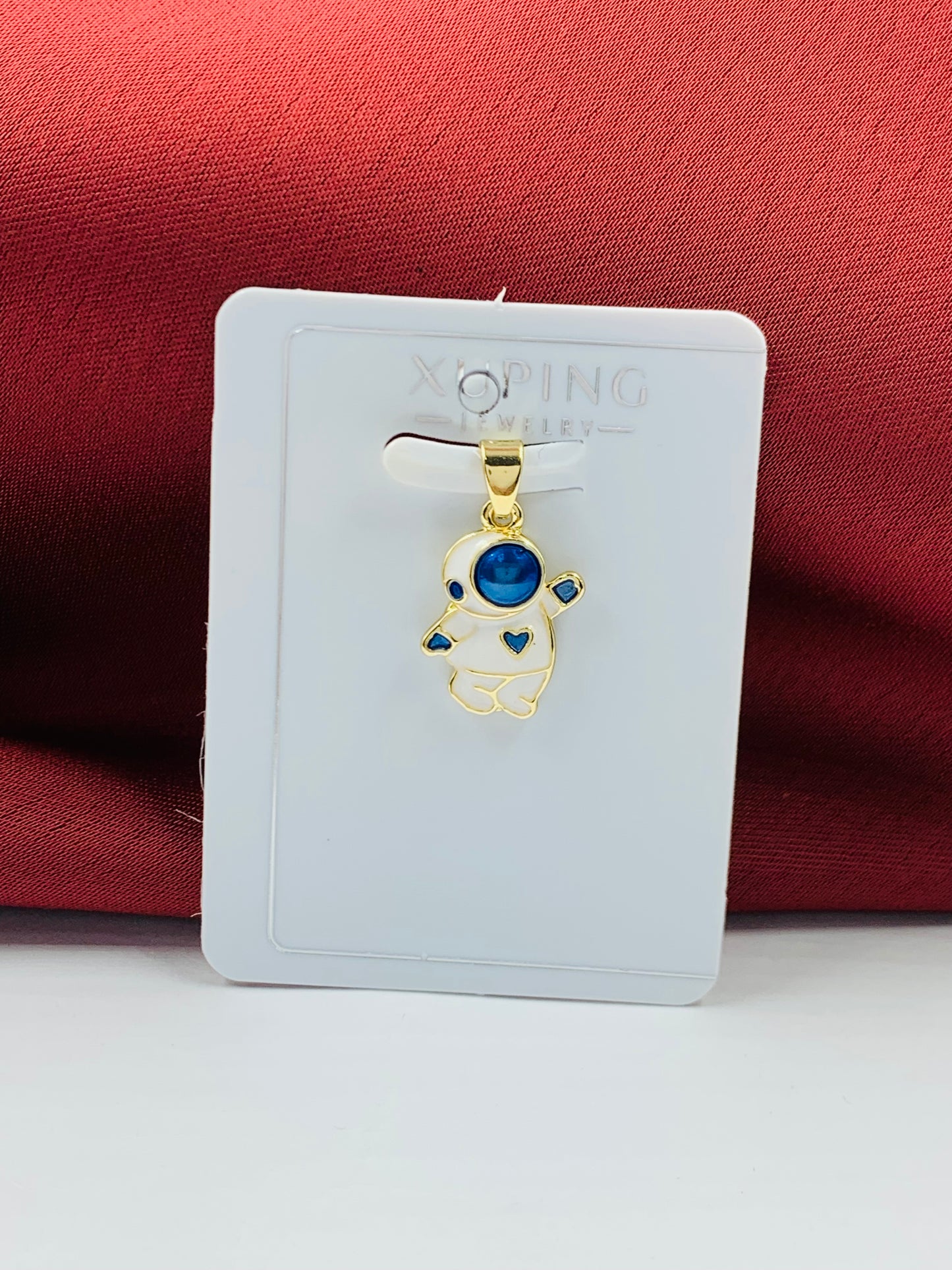 DIJE RODIO ASTRONAUTA DORADO