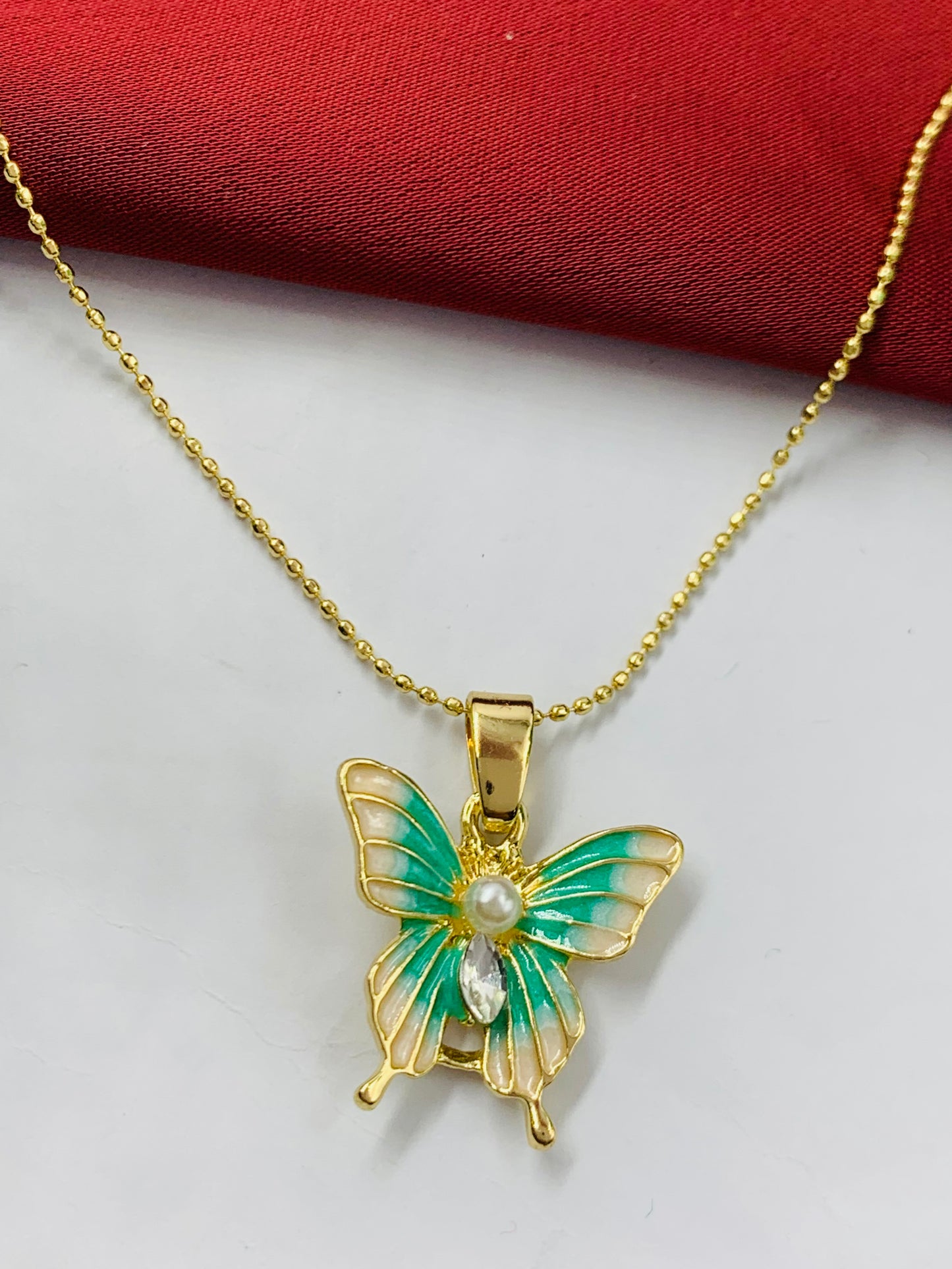 DIJE RODIO MARIPOSA DORADO