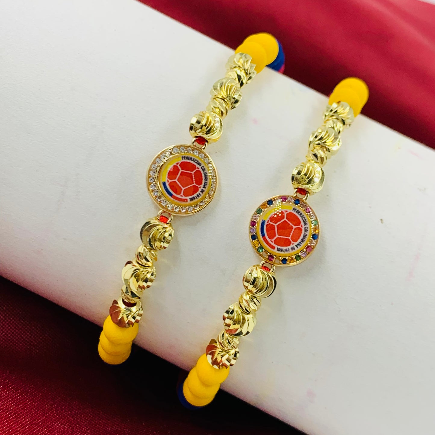 PULSERA RODIO NEOPRENO BALIN DIAMANTADO DORADO BALON COLOMBIA