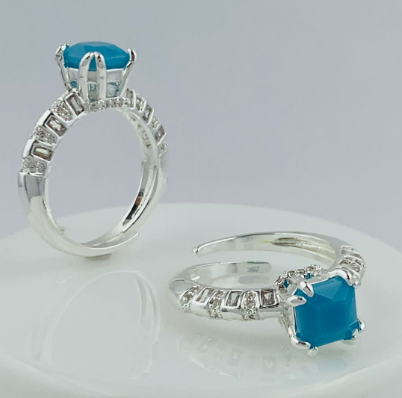 ANILLO RODIO CIRCON AZUL CUADRADO PLATIZADO