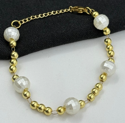 PULSERA RODIO PERLA DORADO