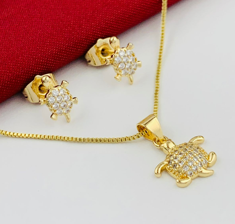 JUEGO RODIO TORTUGA CIRCON DORADO