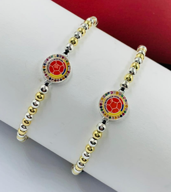 PULSERA RODIO COLOMBIA BALIN PLATIZADO DORADO MEDIANO ESCUDO