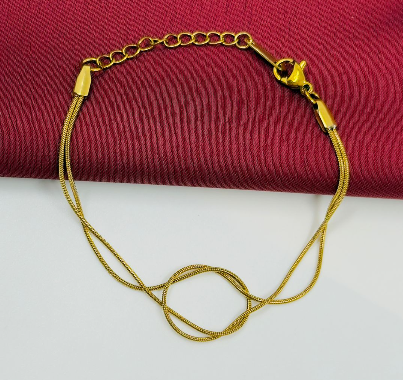 PULSERA ACERO INOXIDABLE NUDO AMOR DORADO