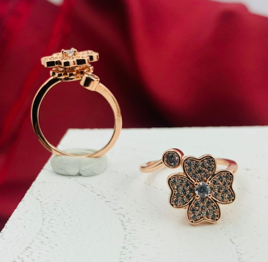 ANILLO RODIO GIRATORIO FLOR 4 PETALOS CIRCON BLANCO ROSA