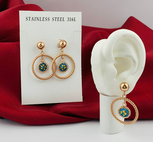 ARETE ACERO INOXIDABLE FILIGRANA CIRCULO ROSA TEJIDO