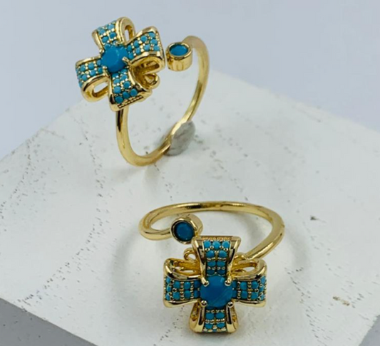 ANILLO RODIO GIRATORIO CRUZ CIRCON AZUL DORADO