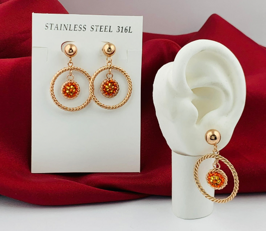 ARETE ACERO INOXIDABLE FILIGRANA CIRCULO TEJIDO NARANJA