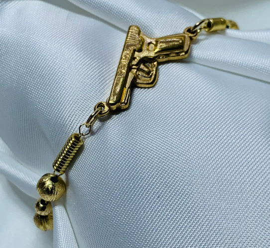PULSERA RODIO DORADO PISTOL4