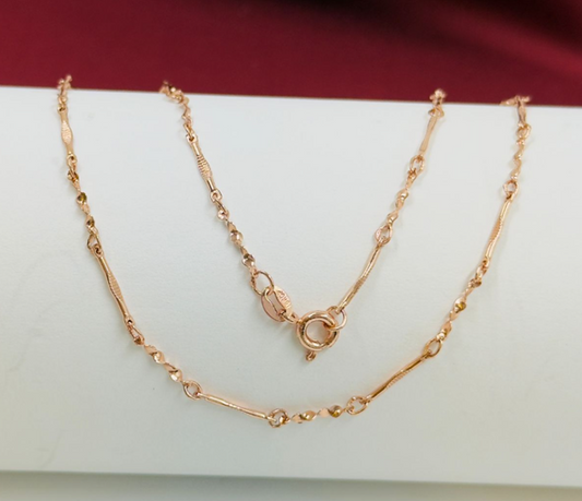 CADENA RODIO TIPO HUESITOS ROSA