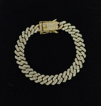 PULSERA RODIO CIRCONES DORADA REGUETONERA