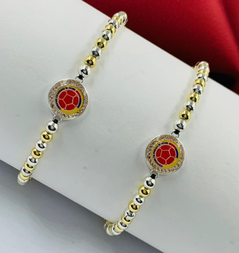 PULSERA RODIO COLOMBIA BALIN PLATIZADO DORADO ESCUDO