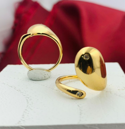 ANILLO RODIO GOTA CIRCON PEQUE LADOS DORADO