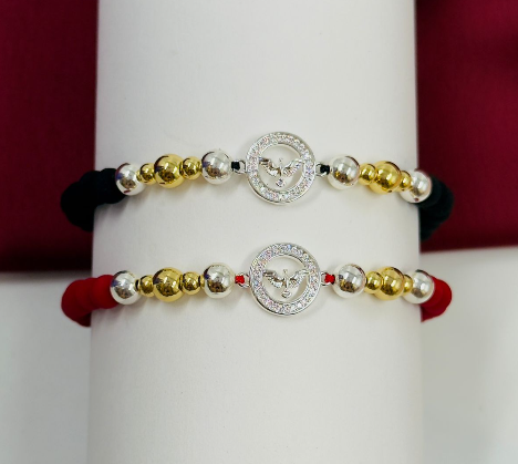 PULSERA RODIO NEOPRENO Y PLATIZADA DORADA DIJE PALOMA