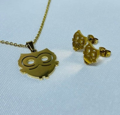 JUEGO BUHO ACERO DORADO