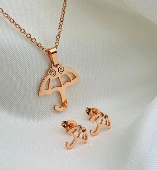 JUEGO SOMBRILLA ROSADO