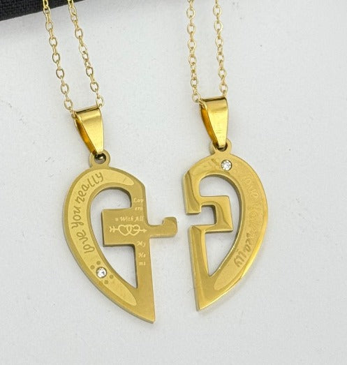DUO CORAZON CRUZ DORADO ACERO INOXIDABLE