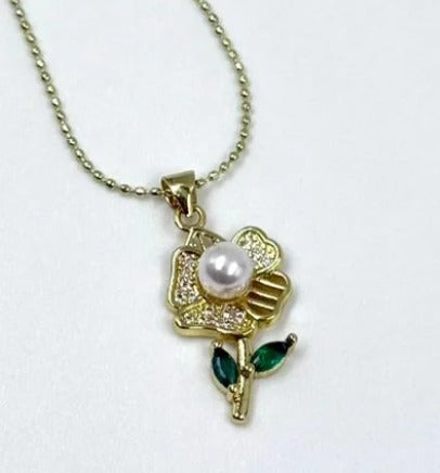 DUO FLOR CON PERLA DORADO RODIO