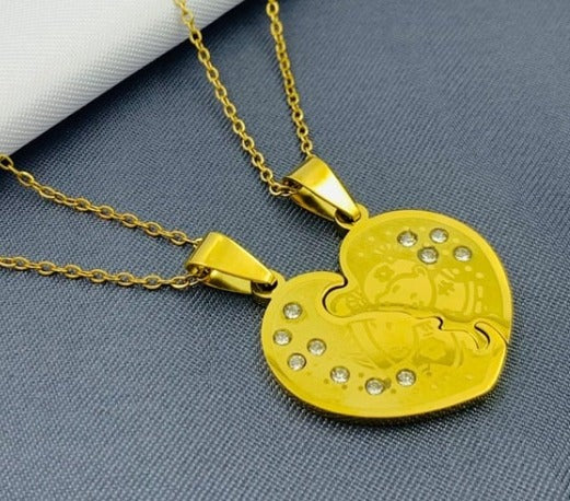 DUO CORAZON PARTIDO DORADO ACERO INOXIDABLE