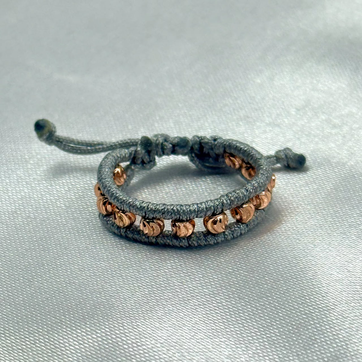 ANILLO RODIO TEJIDO GRIS DIAMANTADO ROSA