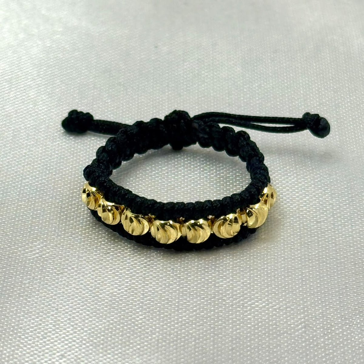 ANILLO RODIO TEJIDO NEGRO DIAMANTADO DORADO
