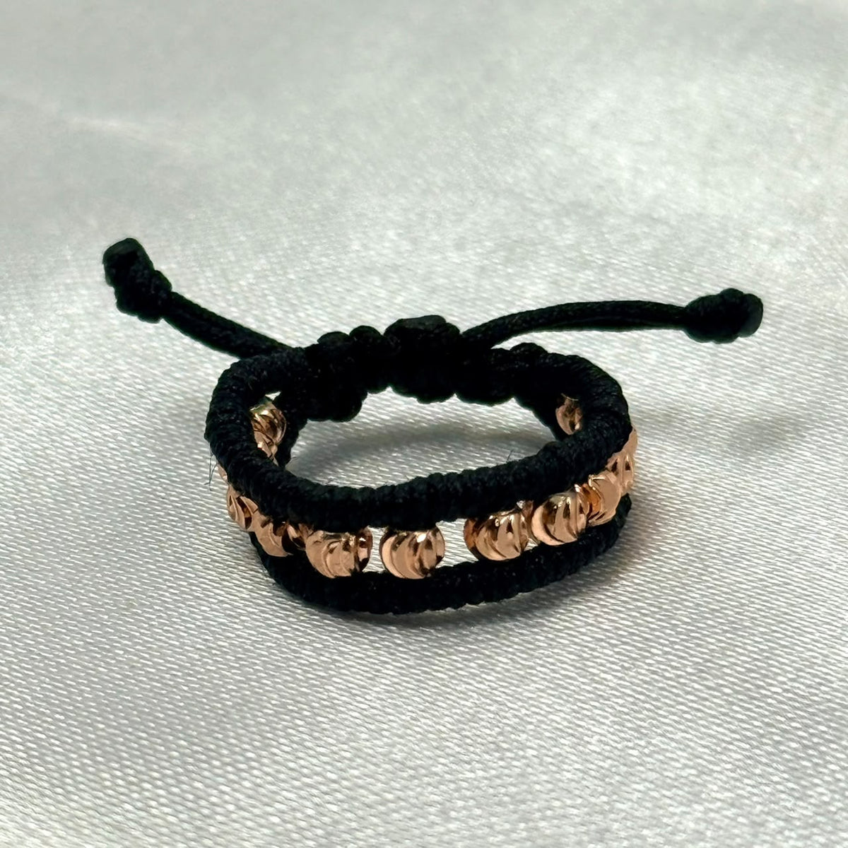 ANILLO RODIO TEJIDO NEGRO DIAMANTADO ROSA