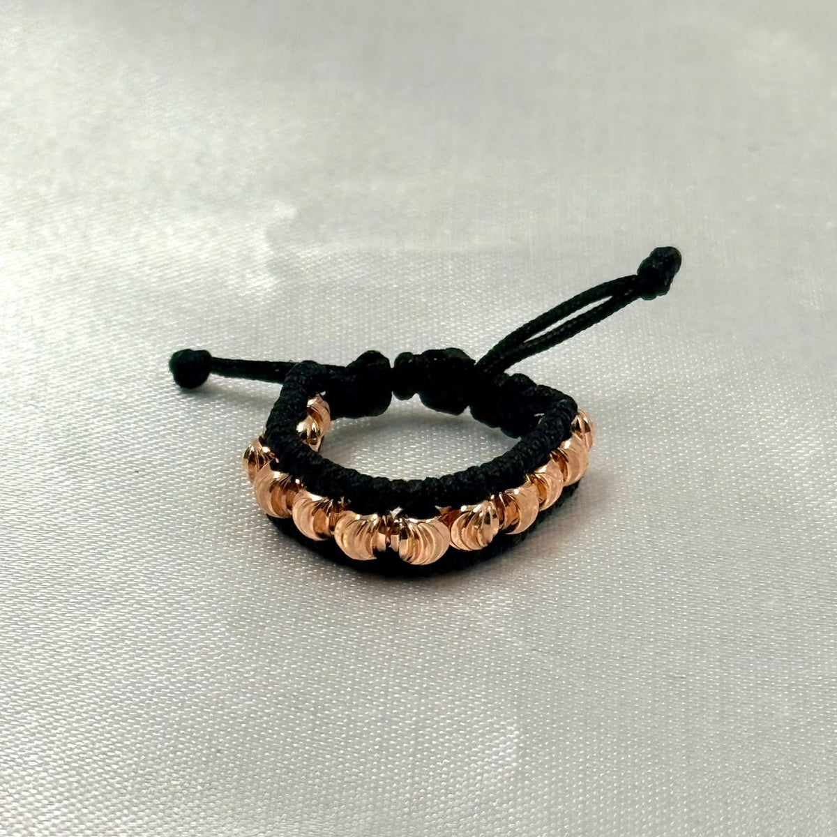 ANILLO RODIO TEJIDO NEGRO DIAMANTADO ROSA