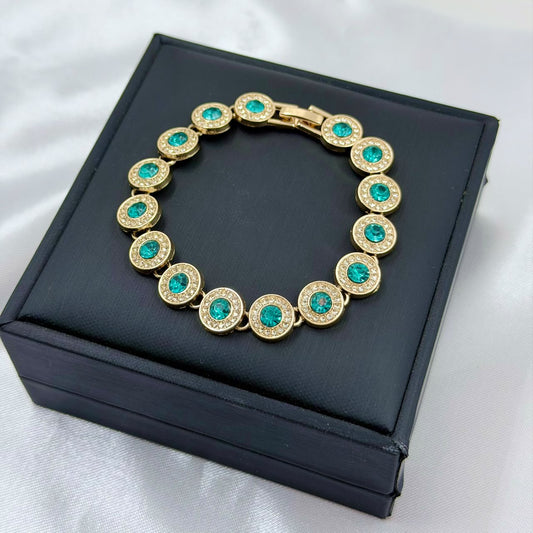 PULSERA RODIO AZUL CIRCON CENTRO REDONDO DORADO